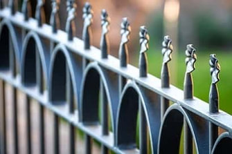 Black metal fence with decorative spears in Peterborough, Ontario.